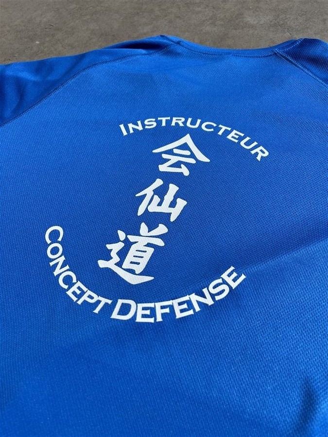 Flocage dos polo bleu Concept Defense Instructeur