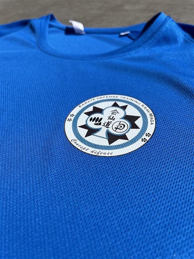 Transfert polo bleu Concept Defense Krav-Maga badge rond